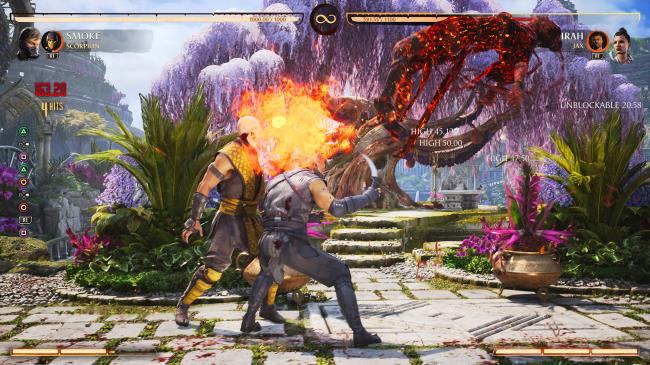 Scorpion spitting fire and hitting Ashrah, which makes her juggle higher.